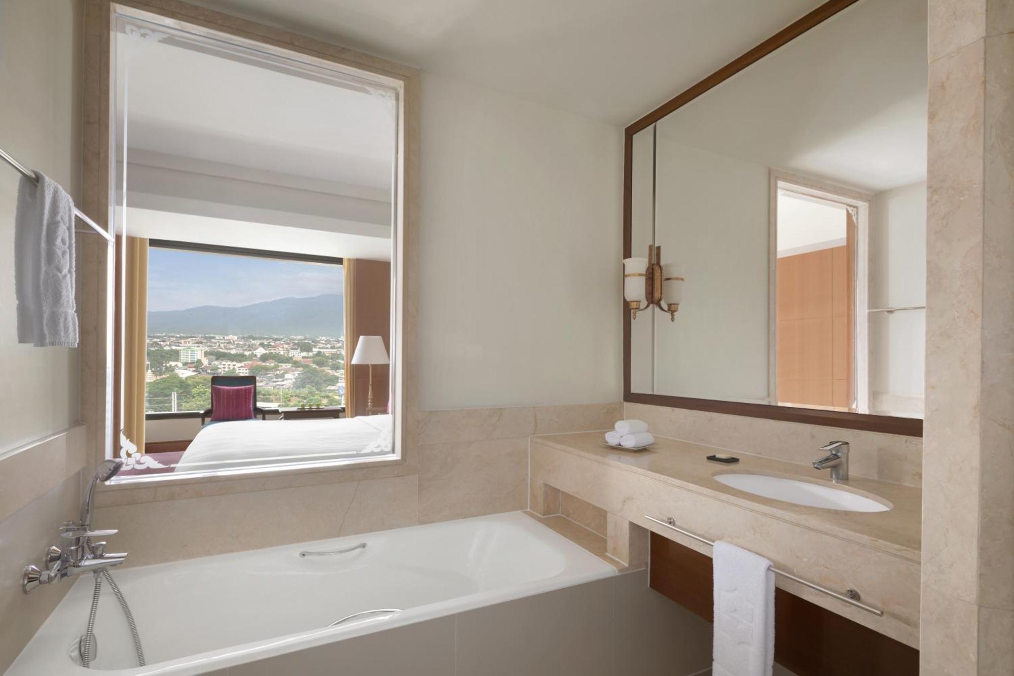 Deluxe Zweibettzimmer mit Poolblick